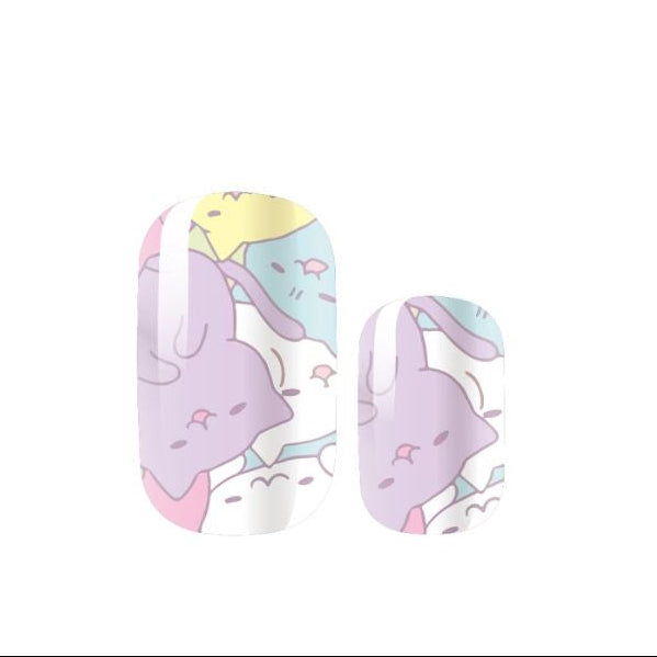 Pastel-colored nail art design with cartoon cats on a white background