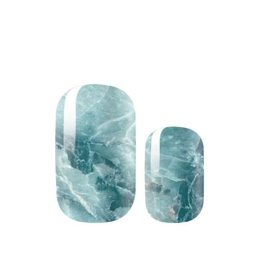 Marble-patterned nail wraps on a white background