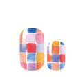 Colorful checkered nail art design on a white background