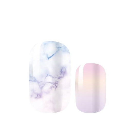 Two nail polish samples with marble and gradient designs on a white background